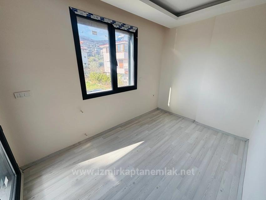 Villa Mit 4+1 Schlafzimmern Und Meerblick Sowie Eigentumswohnung In Seferihisar Doğanbey Zu Verkaufen