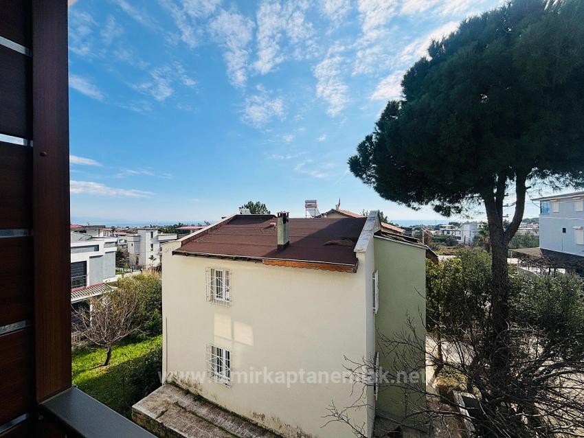 Villa Mit 4+1 Schlafzimmern Und Meerblick Sowie Eigentumswohnung In Seferihisar Doğanbey Zu Verkaufen