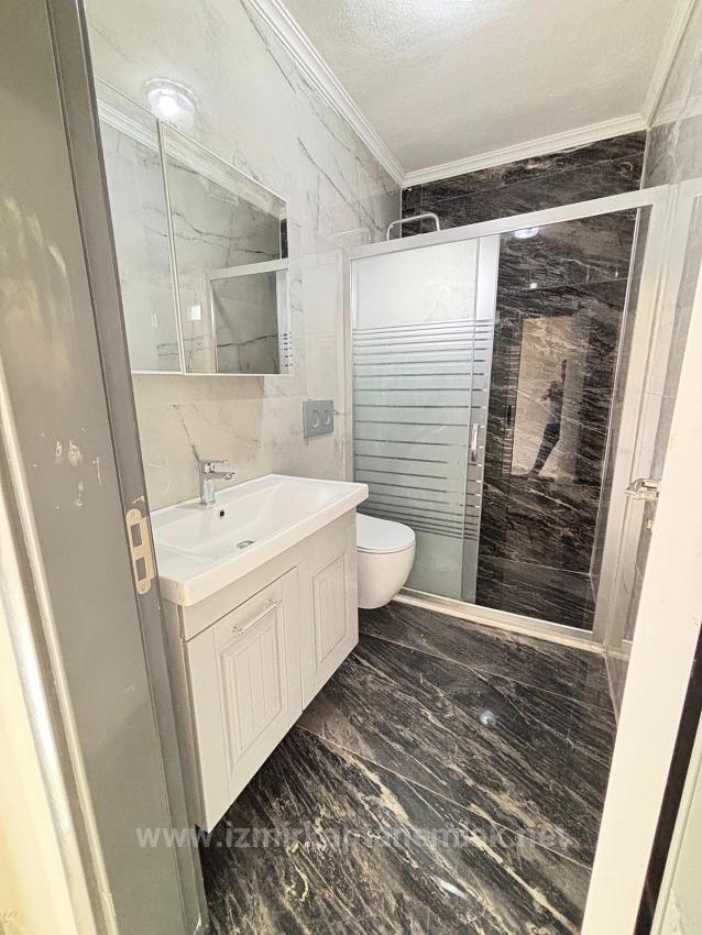 Villa Mit 4+1 Schlafzimmern Und Meerblick Sowie Eigentumswohnung In Seferihisar Doğanbey Zu Verkaufen