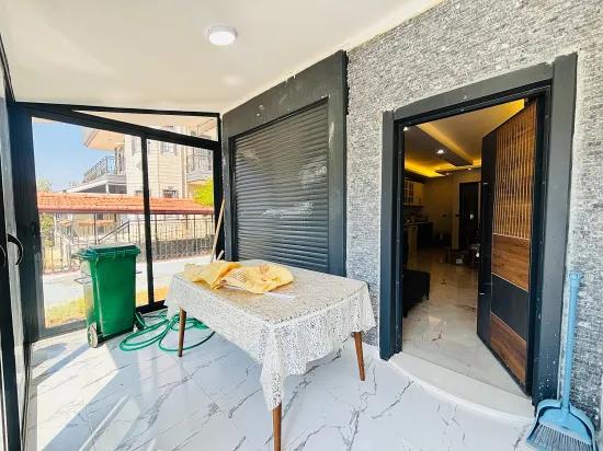 In İzmir Seferihisar Atatürk Mahallesi 2+1 geräumig mit Garten zu verkaufen Villa