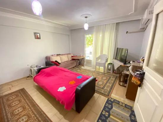 İzmir Seferihisar Im Viertel Mersin-gebiet geräumige 2+1 Wohnung mit Garten zu verkaufen