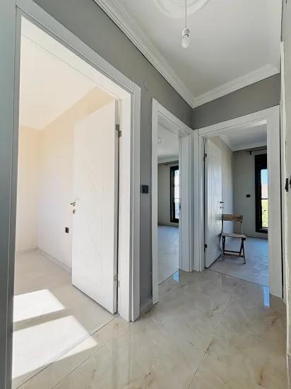 In İzmir Seferihisar Cumhuriyet Viertel mit gemeinsamem Eingang 3+1 zu verkaufen freistehende Villa