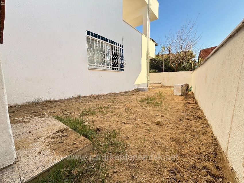 2+1 Apartment For Sale In Seferihisar Ürkmez With Separate Kitchen And Garden, No Expenses