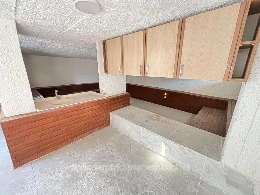 2+1 Apartment For Sale In Seferihisar Ürkmez With Separate Kitchen And Garden, No Expenses