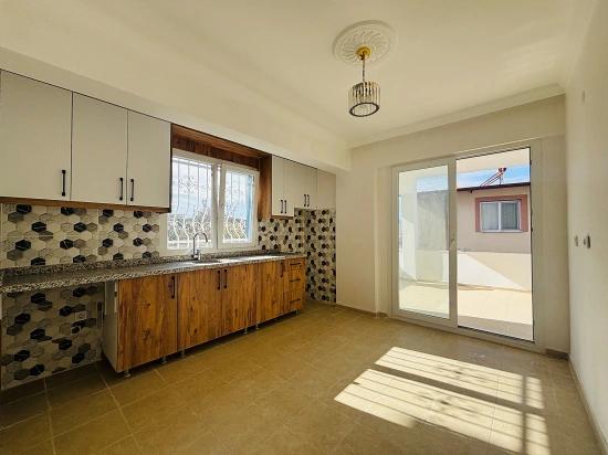 2+1 Apartment For Sale In Seferihisar Ürkmez With Separate Kitchen And Garden, No Expenses