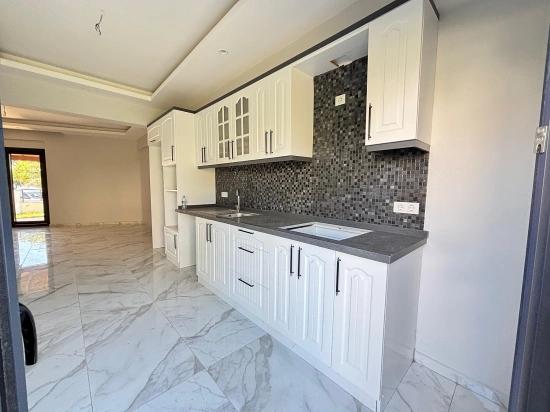 Brand New 4+1 Triplex For Sale In Menderes Özdere, 50 M From The Beach With A Large Garden