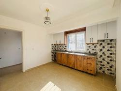 2+1 Apartment For Sale In Seferihisar Ürkmez With Separate Kitchen And Garden, No Expenses