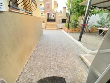 2 1 Apartment For Sale In Ürkmez Center With Closed Garage And Garden