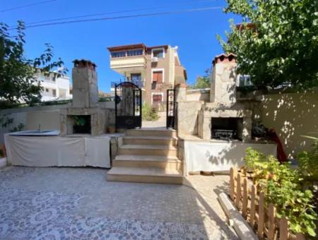 2 1 Apartment For Sale In Ürkmez Center With Closed Garage And Garden