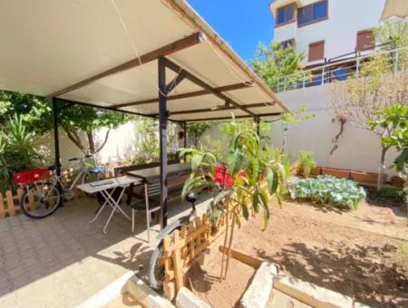 2 1 Apartment For Sale In Ürkmez Center With Closed Garage And Garden