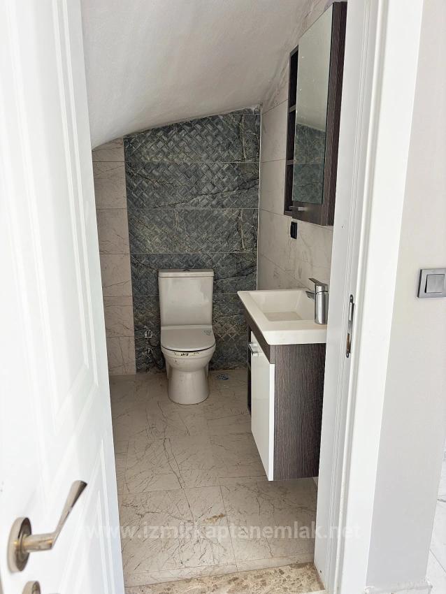 Продается Вилла 4+1 С Садом В Районе Сеферихисар-Доганбей, В 400 Метрах От Пляжа