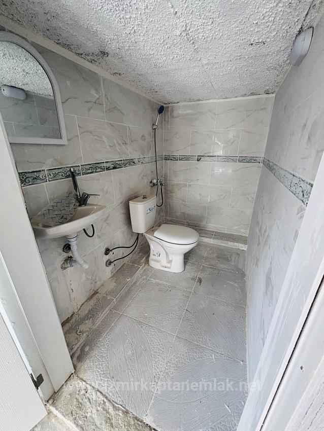 Продаётся Квартира 2+1 В Районе Сеферихисар-Уркмез С Отдельной Кухней И Садом. Без Расходов.