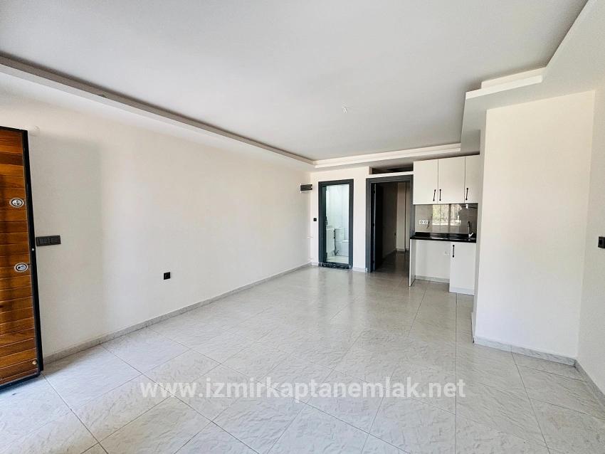Для продажи Квартира 1+1 в Payamlı Seferihisar Doğanbey - 55 m²