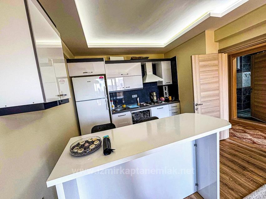 Продается Квартира (1+1) В Жилом Комплексе С Бассейном В Районе Бенгилер, Сеферихисар, Измир.