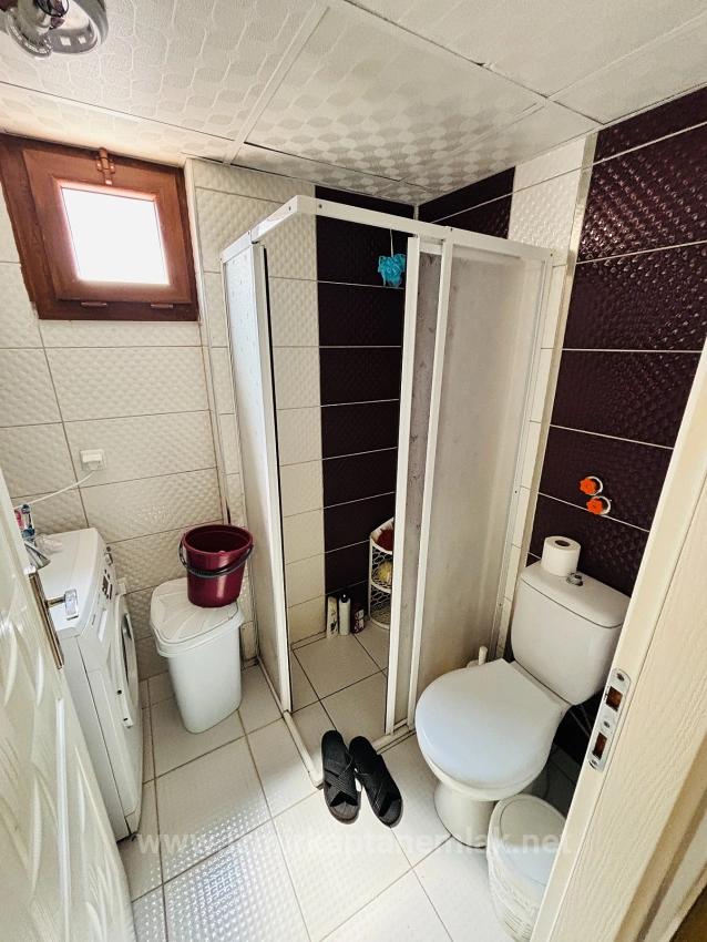 İzmir Seferihisar Bengiler’de Merkezi Konumda Cam Balkonlu   2+1 Zemin Kat Daire