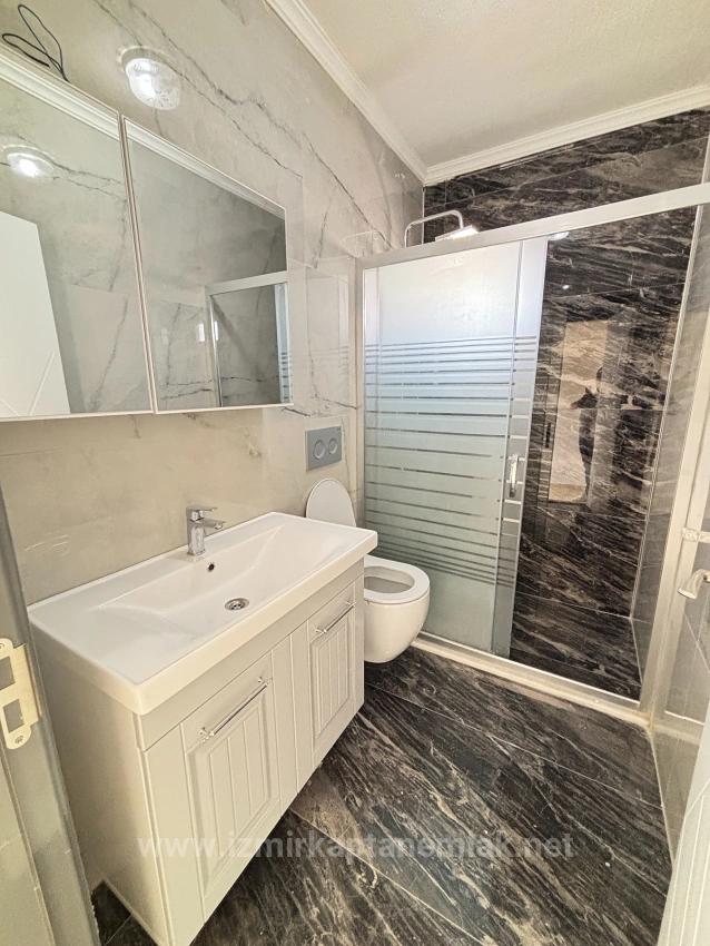 Seferihisar Doğanbey'de Deniz Manzaralı Kat Mülkiyetli 4+1 Satılık Villa