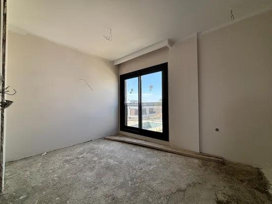 İzmir Seferihisar Deniz Manzaralı Havuzlu Site İçerisinde satılık Dubleks Tripleks Villa