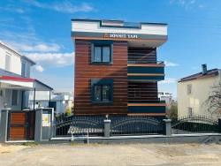 Seferihisar Doğanbey'de Deniz Manzaralı Kat Mülkiyetli 4+1 Satılık Villa