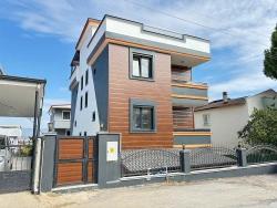 Seferihisar Doğanbey'de Deniz Manzaralı Kat Mülkiyetli 4+1 Satılık Villa